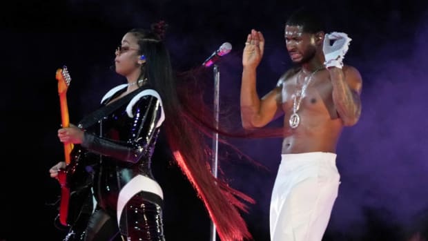 Usher performs.